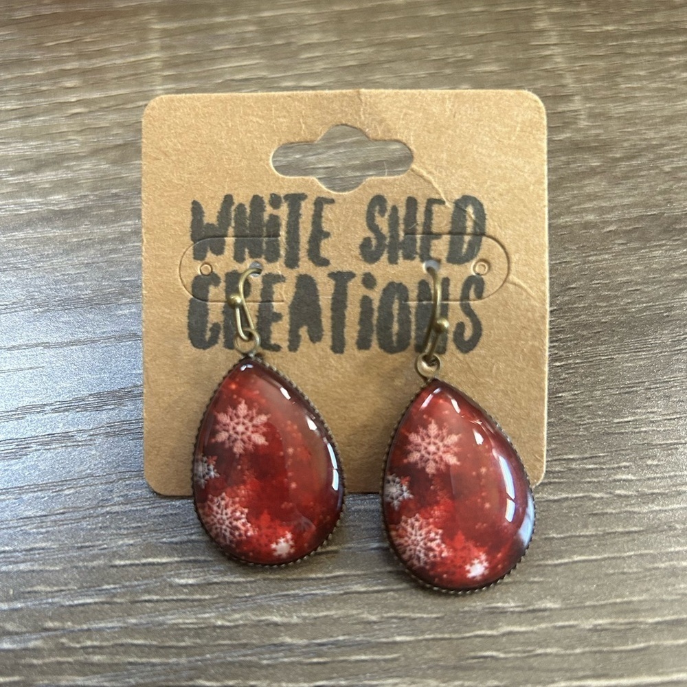 New red dangle earrings with white snowflakes